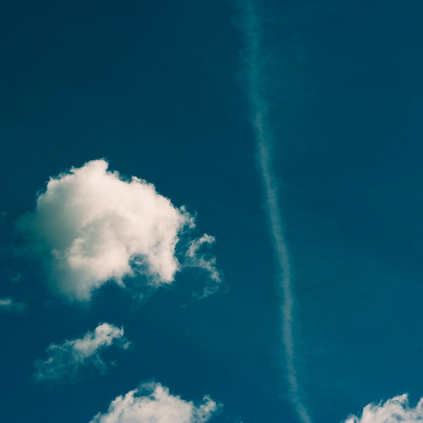 Blue sky and white smoke